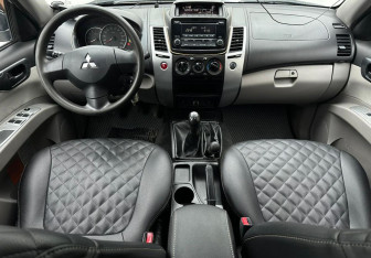 Подержанный автомобиль Mitsubishi Pajero Sport 2014 года (11 фото)