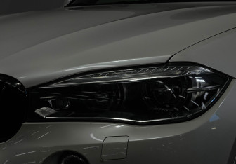 Подержанный автомобиль BMW X6 2016 года (7 фото)
