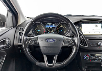 Подержанный автомобиль Ford Focus Hatchback 2018 года (15 фото)
