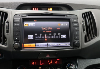 Подержанный автомобиль Kia Sportage 2014 года (21 фото)