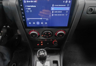 Подержанный автомобиль Mazda 3 Hatchback 2007 года (15 фото)