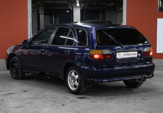 Подержанный автомобиль Nissan Almera Hatchback 1997 года (4 фото)
