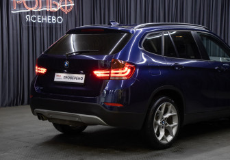 Подержанный автомобиль BMW X1 2013 года (22 фото)