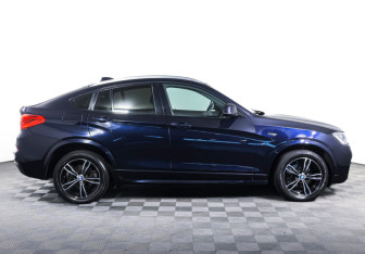 Подержанный автомобиль BMW X4 2017 года (4 фото)