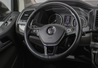 Подержанный автомобиль Volkswagen Multivan 2016 года (15 фото)