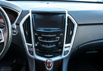 Подержанный автомобиль Cadillac SRX 2014 года (14 фото)