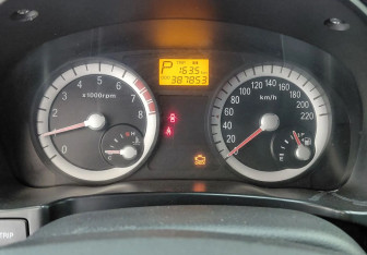 Подержанный автомобиль Kia Rio Sedan 2006 года (13 фото)