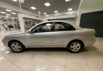 Подержанный автомобиль Nissan Almera Classic 2010 года (8 фото)