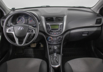 Подержанный автомобиль Hyundai Solaris Hatchback 2011 года (13 фото)