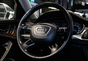 Подержанный автомобиль Audi A6 Sedan 2015 года (13 фото)