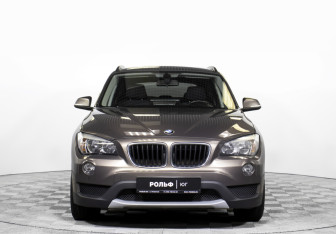 Подержанный автомобиль BMW X1 2013 года (2 фото)
