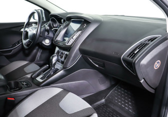 Подержанный автомобиль Ford Focus Wagon 2014 года (8 фото)