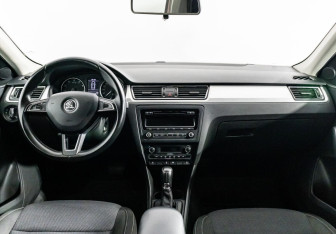 Подержанный автомобиль Skoda Rapid Liftback 2014 года (6 фото)