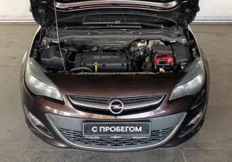 Подержанный автомобиль Opel Astra Sedan 2014 года (15 фото)