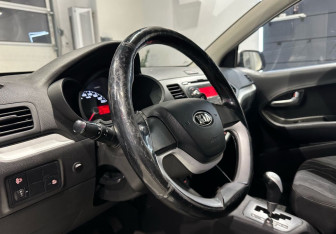Подержанный автомобиль Kia Picanto 2014 года (12 фото)