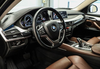Подержанный автомобиль BMW X6 2016 года (6 фото)