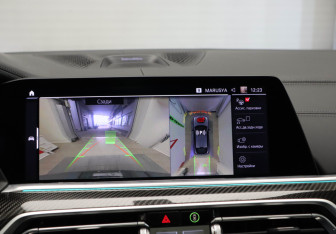 Подержанный автомобиль BMW X6 M 2021 года (24 фото)