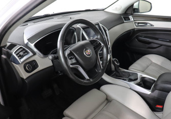 Подержанный автомобиль Cadillac SRX 2013 года (9 фото)