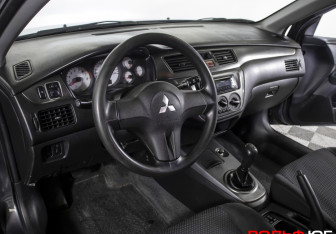 Подержанный автомобиль Mitsubishi Lancer Sedan 2009 года (18 фото)