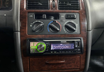 Подержанный автомобиль Toyota Avensis Sedan 1999 года (13 фото)