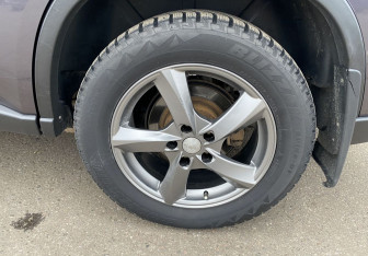 Подержанный автомобиль Nissan X-Trail 2013 года (12 фото)