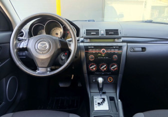 Подержанный автомобиль Mazda 3 Hatchback 2008 года (11 фото)