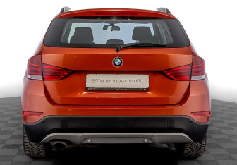 Подержанный автомобиль BMW X1 2014 года (6 фото)