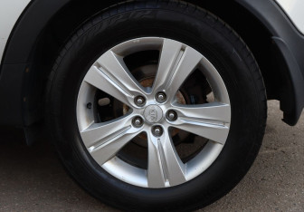 Подержанный автомобиль Kia Sportage 2013 года (9 фото)