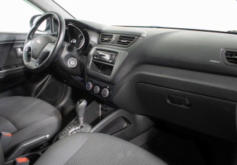 Подержанный автомобиль Kia Rio Sedan 2015 года (9 фото)