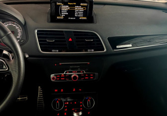 Подержанный автомобиль Audi RS Q3 2015 года (14 фото)