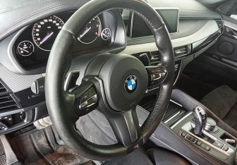 Подержанный автомобиль BMW X6 2019 года (12 фото)