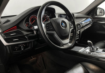 Подержанный автомобиль BMW X5 2014 года (12 фото)