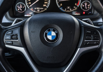 Подержанный автомобиль BMW X6 2015 года (11 фото)