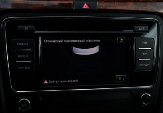 Подержанный автомобиль Skoda Superb Liftback 2013 года (13 фото)