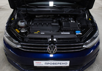 Подержанный автомобиль Volkswagen Touran 2019 года (9 фото)