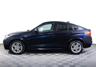 Подержанный автомобиль BMW X4 2016 года (8 фото)