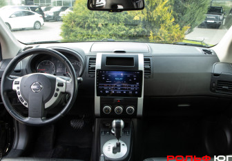 Подержанный автомобиль Nissan X-Trail 2011 года (10 фото)