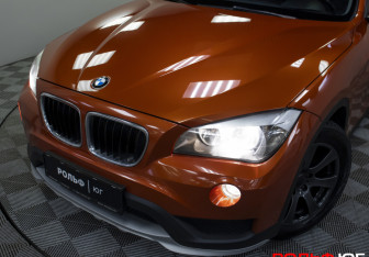 Подержанный автомобиль BMW X1 2014 года (23 фото)