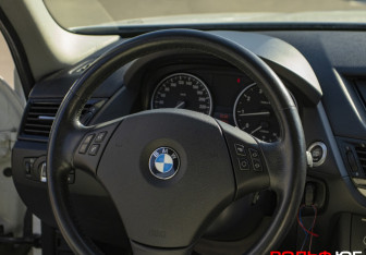 Подержанный автомобиль BMW X1 2014 года (15 фото)