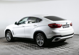Подержанный автомобиль BMW X6 2015 года (7 фото)