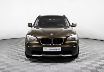 Подержанный автомобиль BMW X1 2011 года (2 фото)