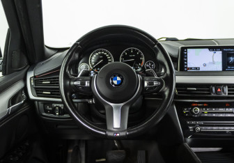 Подержанный автомобиль BMW X6 2018 года (11 фото)