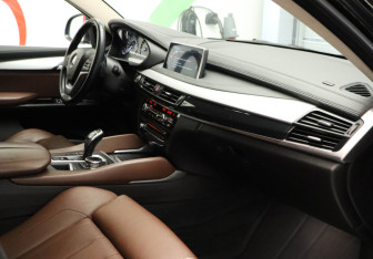 Подержанный автомобиль BMW X6 2016 года (19 фото)
