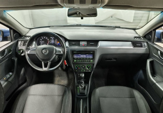 Подержанный автомобиль Skoda Rapid Liftback 2014 года (11 фото)