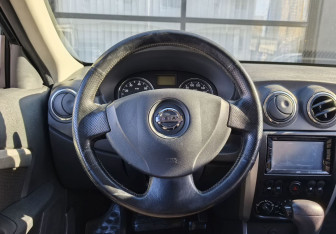 Подержанный автомобиль Nissan Almera Sedan 2014 года (15 фото)