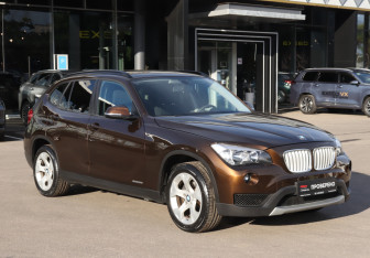 Подержанный автомобиль BMW X1 2013 года (3 фото)