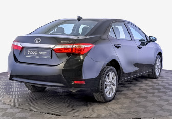 Подержанный автомобиль Toyota Corolla Sedan 2017 года (5 фото)