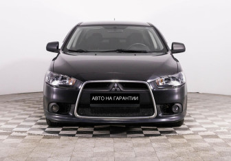 Подержанный автомобиль Mitsubishi Lancer Sedan 2014 года (2 фото)