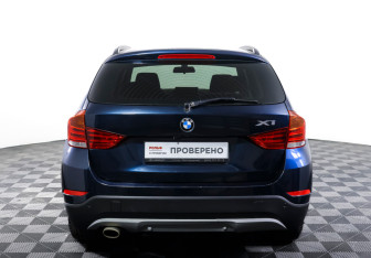 Подержанный автомобиль BMW X1 2014 года (6 фото)