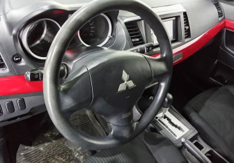 Подержанный автомобиль Mitsubishi Lancer Sedan 2014 года (12 фото)